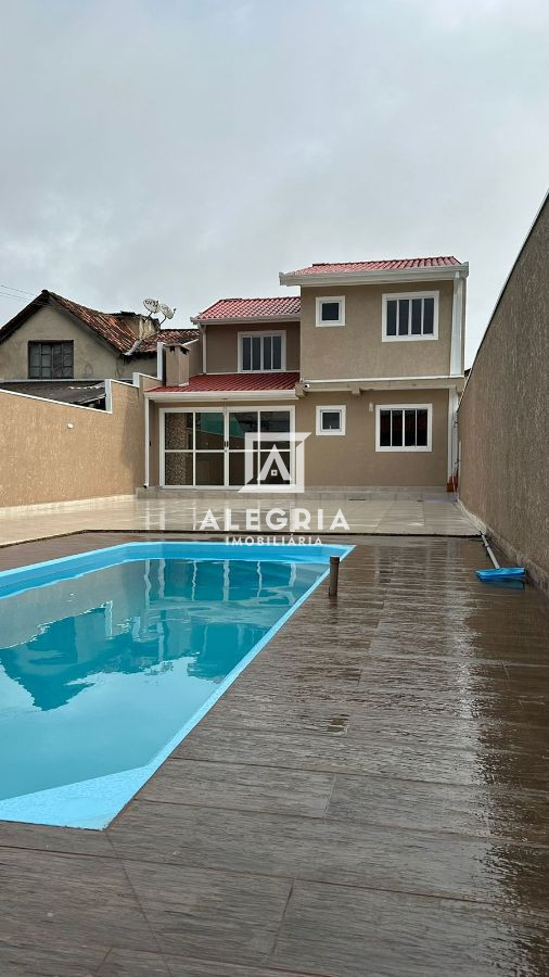 Lindo Sobrado com amplo terreno e piscina, Bairro Colonia Rio Grande em São José dos Pinhais