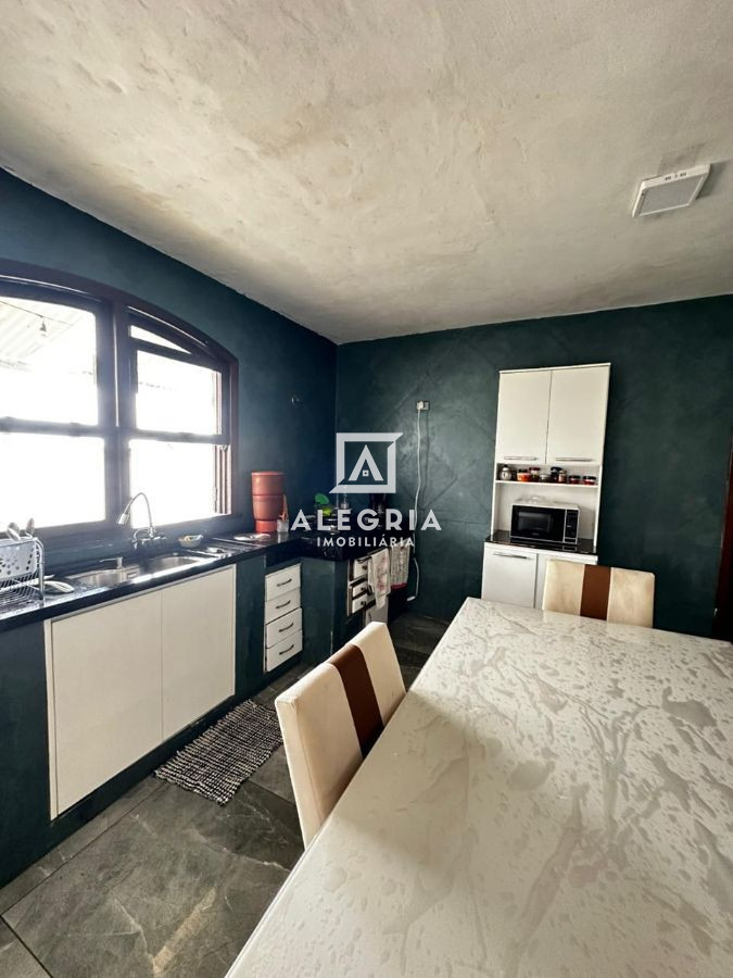 Linda casa 3 Dormitórios sendo uma suíte no bairro Costeira em São José dos Pinhais