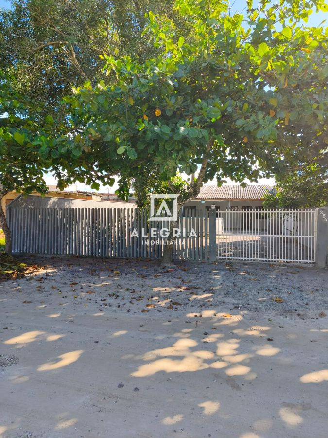 Casa térrea com estrutura para sobrado 3 dormitórios a 2 quadras da praia em Guaratuba
