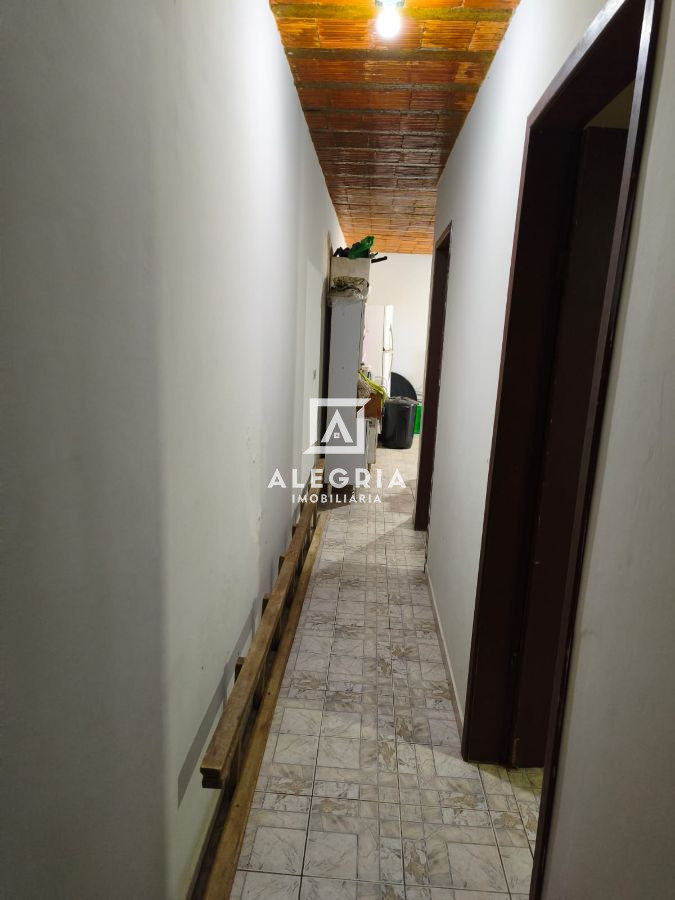 Casa térrea com estrutura para sobrado 3 dormitórios a 2 quadras da praia em Guaratuba